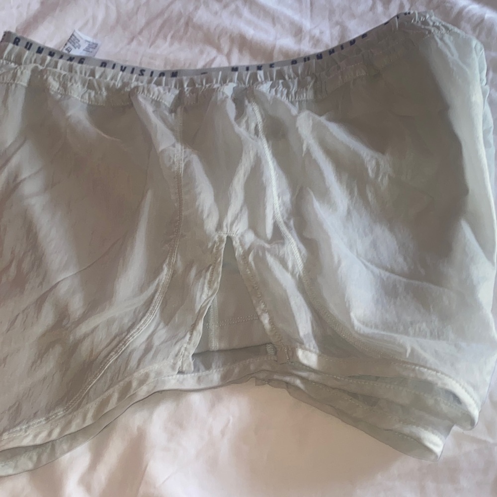Nike Women's Light Gray Shorts with black Swoosh - Picture 9 of 11